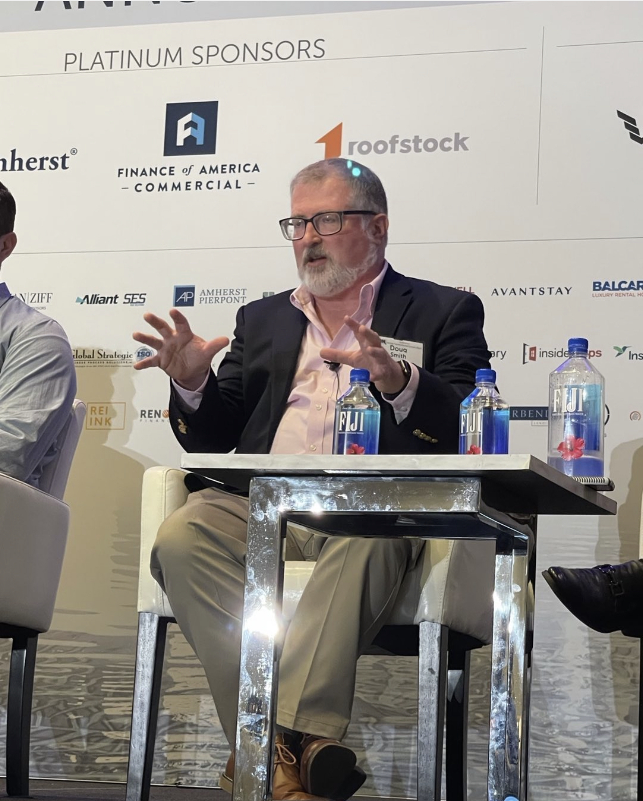 Doug Smith speaking on an industry lending panel
